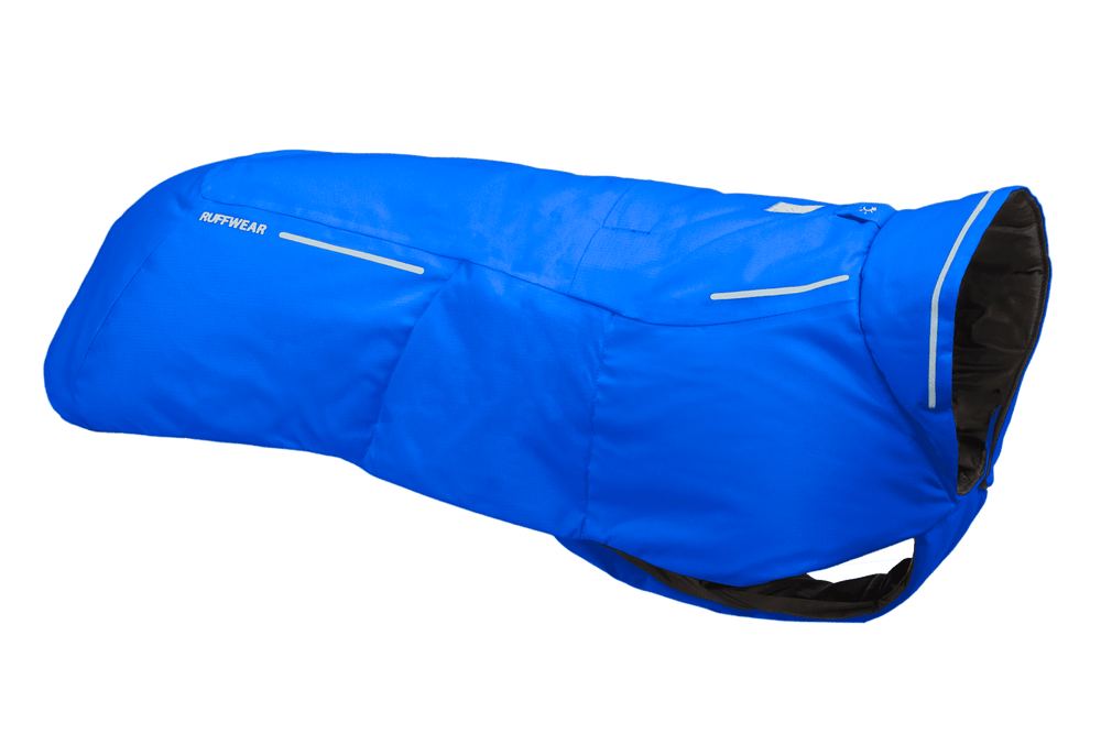 Blaue Vert™ Jacke für Hunde mit reflektierenden Streifen und weicher Innenseite, ideal für kühle Wetterbedingungen.
