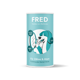 Türkise Verpackung der FRED Dental Sticks mit weißem und schwarzem Design, ideal für gesunde Zähne von Hunden.