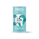 Türkise Verpackung der FRED Dental Sticks mit weißem und schwarzem Design, ideal für gesunde Zähne von Hunden.