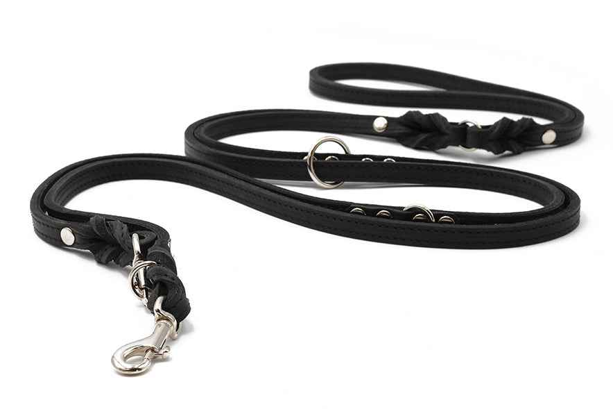 Schwarze geflochtene Lederleine mit Karabiner und silbernen Details, 3m lang, ideal für stilvolle Hundebesitzer.
