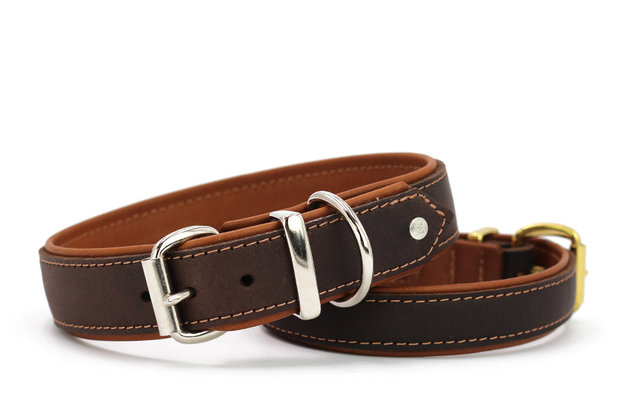 Hochwertiger Ledergürtel in Dunkelbraun mit hellbraunem Innenfutter und robuster silberner Schnalle, ideal für jeden Anlass.