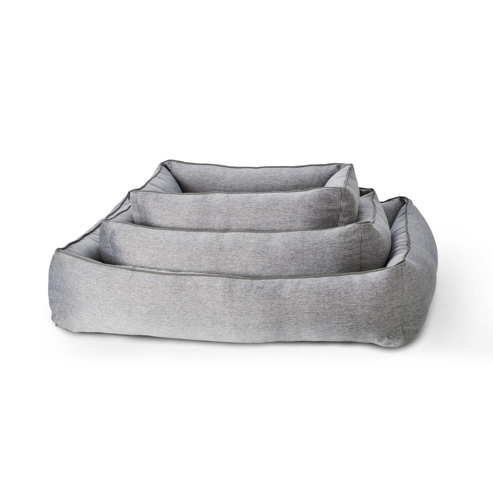 "Stapelbare Hundebett-Serie UNO in Grau mit erhöhtem Rand für optimalen Komfort und modernes Design."