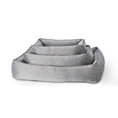 "Stapelbare Hundebett-Serie UNO in Grau mit erhöhtem Rand für optimalen Komfort und modernes Design."