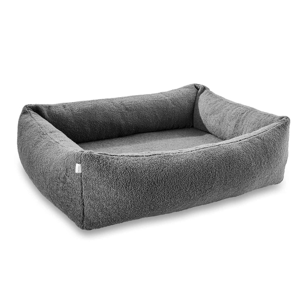 "Bequemes ORTHO Hundebett TEDDY in Grau, rechteckig mit hohen, gepolsterten Rändern für optimalen Komfort."