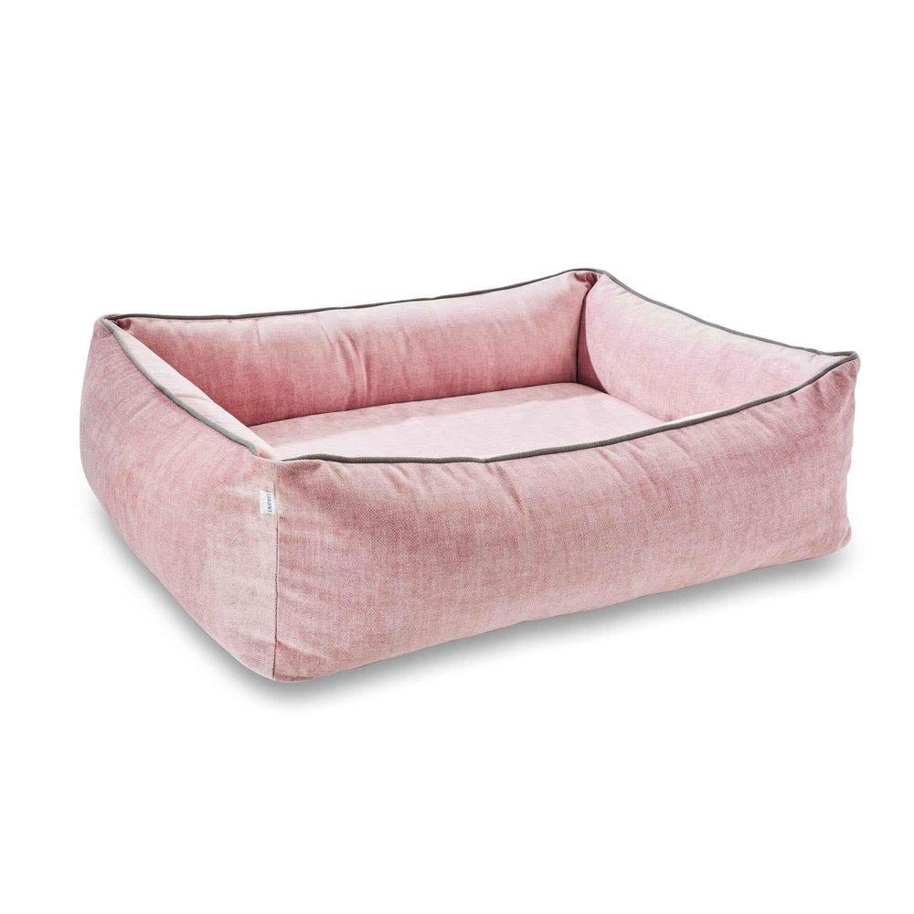 Rosa ORTHO Hundebett GLAM mit hohen gepolsterten Seiten und weicher Liegefläche, ideal für komfortable Ruhezeiten.