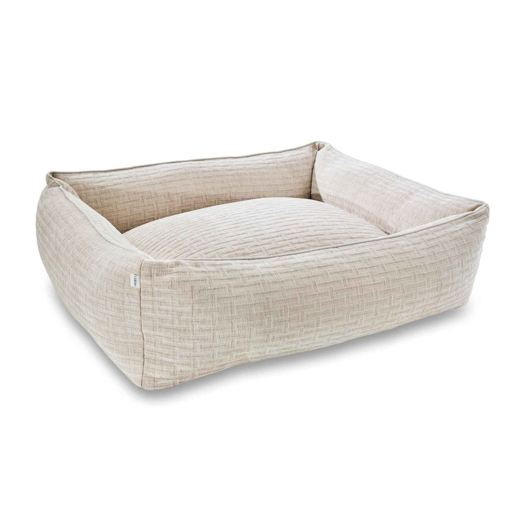 ALT-Text: Rechteckiges CLASSIC Hundebett NOVA in elegantem Beige mit hohen Seitenwänden und gepolsterter Liegefläche.