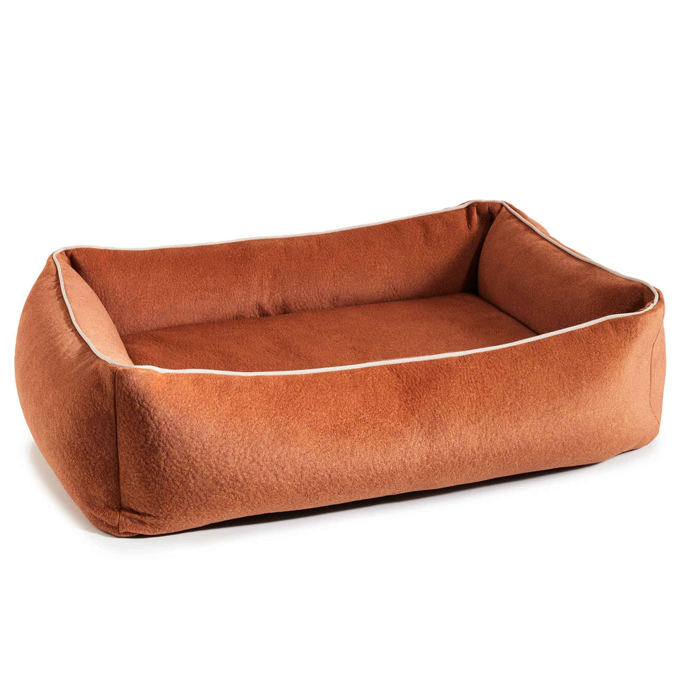 ALT-Text: Braun-samtiges ORTHO Hundebett BUFFALO mit weichen Wänden für optimalen Komfort und Rückhalt für Haustiere.