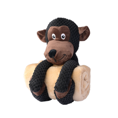 Kuscheltier-Affe mit strahlend großen Augen sitzt auf heller Decke und bringt Freude ins Kinderzimmer.