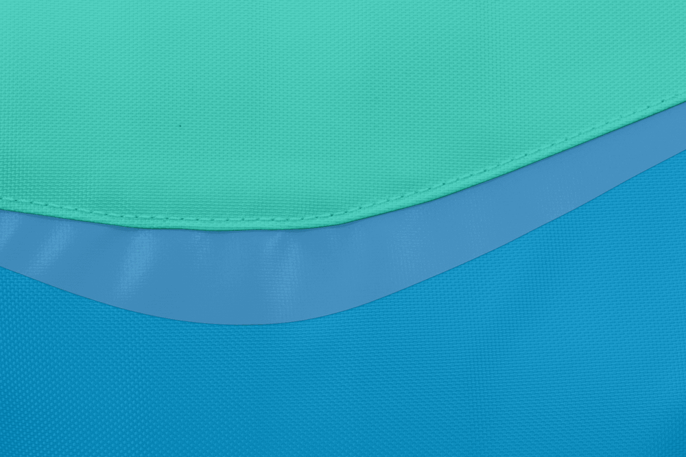 "Float Coat™ Schwimmweste für Hunde in Türkis und Blau mit strukturierter Oberfläche für sicheren Wasserspaß."