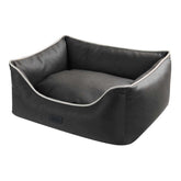 Komfortables eckiges Haustierbett "HORIA" in Grau mit heller Umrandung und gepolsterter Liegefläche. Ideal für Hunde.