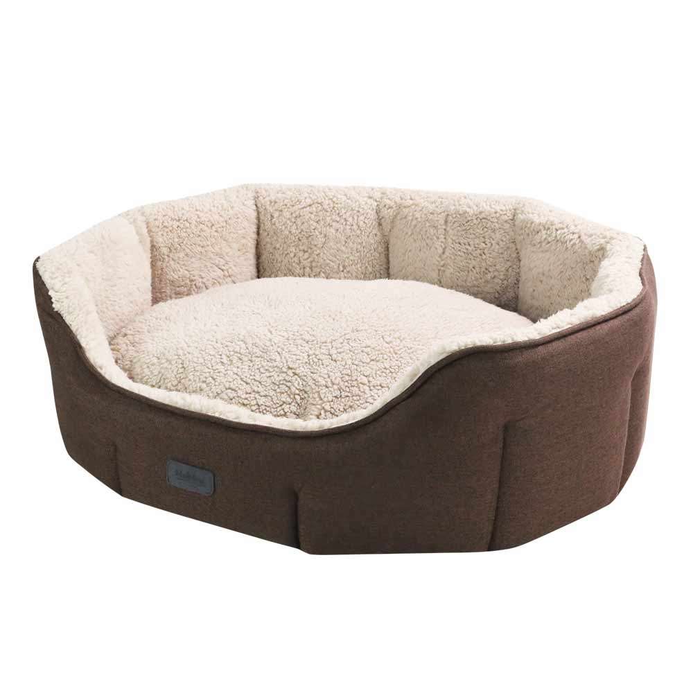 Komfortbett oval "LICA" in braun mit weicher Innenfläche und gepolsterten Wänden für Hunde.