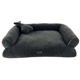 Komfortsofa "JELLA" für Hunde in dunkelgrau mit hohen Seitenrändern und plüschiger Oberfläche, inklusive Kissen.