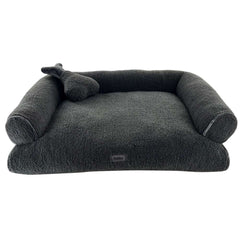 Komfortsofa "JELLA" für Hunde in dunkelgrau mit hohen Seitenrändern und plüschiger Oberfläche, inklusive Kissen.