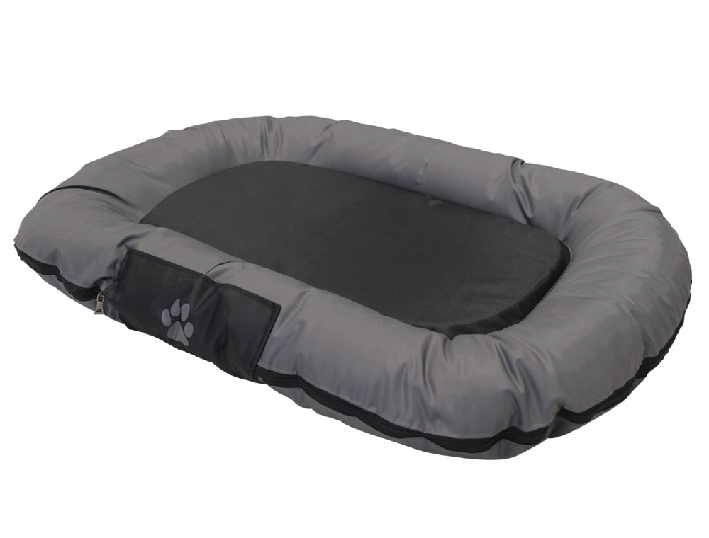 Hundebett "RENO" in ovaler Form mit gepolstertem Rand in Grau und glatter, schwarzer Mitte für optimalen Komfort.