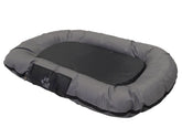Hundebett "RENO" in ovaler Form mit gepolstertem Rand in Grau und glatter, schwarzer Mitte für optimalen Komfort.