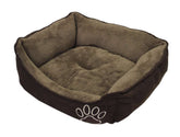 Beige-plüschiges Komfortbett "MERO" für Haustiere mit hohen, weichen Rändern und dunkelbraunem Außenmaterial.