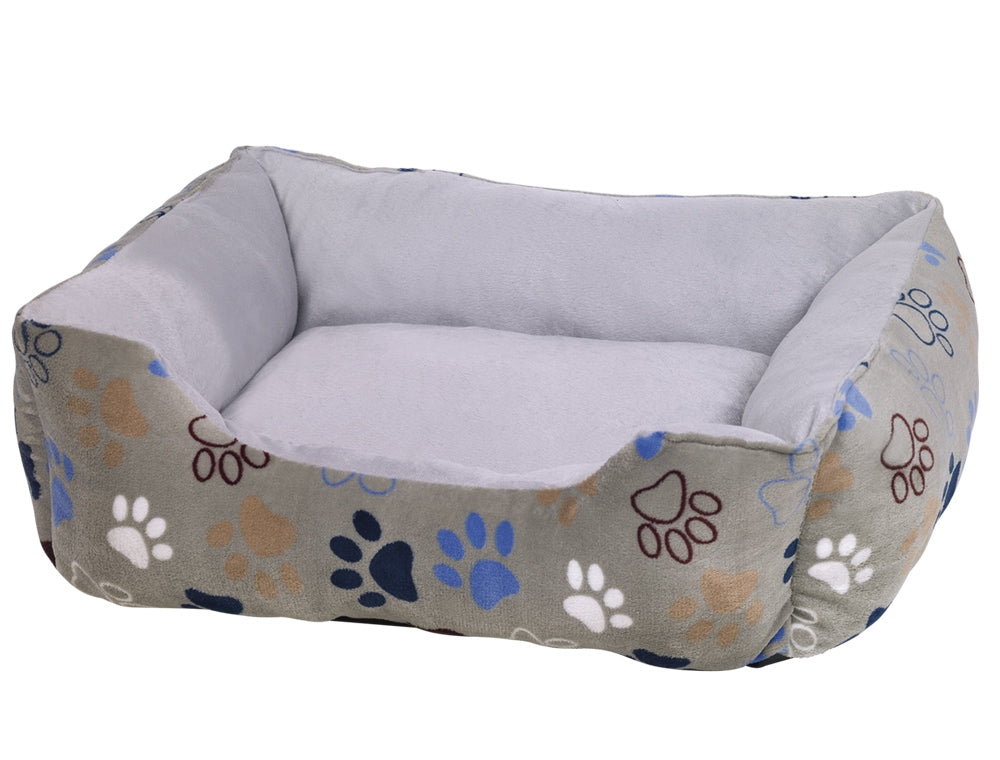 "Hundebett Classic 'Lissi' in Beige mit bunten Pfotenabdrücken und grauem Innenfutter für besten Komfort."