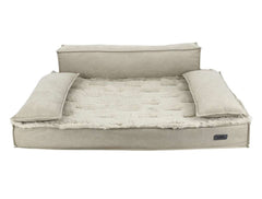 Orthopädisches Hundebett "NUKA" in Beige mit gepolsterter Liegefläche und erhöhten Rückenlehnen für optimalen Komfort.