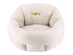 Komfortables ovales Hundebett "Puppy" in creme mit plüschiger Textur und erhöhter Rückenlehne für entspannte Kuschelstunden.