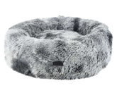 Komfortables rundes Hundebett "Coda" in grauem Felllook mit hohen Rändern für Geborgenheit und kuscheliger Oberfläche.