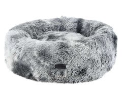 Komfortables rundes Hundebett "Coda" in grauem Felllook mit hohen Rändern für Geborgenheit und kuscheliger Oberfläche.