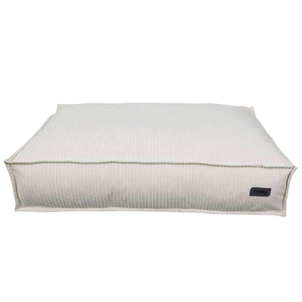 Beige Komfortmatte "KAMBA" mit abgerundeten Kanten und rippenförmigem Stoffdesign. Elegant und schlicht.