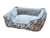 Hundebett "Tonis" in rechteckiger Form mit farbenfrohem Design und weichem, gepolstertem Innenbereich.