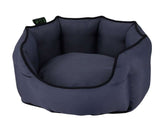 Komfortbett oval "Esat" in Dunkelblau mit schwarzem Rand, ideal für Hunde zum Schlafen und Entspannen.