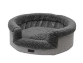 "Komfortbett oval 'Jasin' für Hunde in grau mit flauschiger Innenseite und strukturierter Außenfläche."