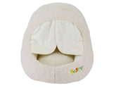 Kuscheliges ovales Hundebett in hellem Creamton mit weichem Innenfutter und überlappendem Einstieg. Ideal für Hunde.