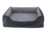 Komfortbett "Vara" für Haustiere mit hohen, gepolsterten Seiten und weicher grauer Innenfläche.