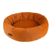Rundes orangefarbenes Hundebett "Cumba" mit hohem Rand und weichem Innenbereich für optimalen Komfort.