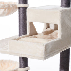 Kratzbaum CORLU mit gepolstertem Schlafplatz und Höhle für Katzen in cremefarbenem Design. Ideal für Entspannung und Spiel.
