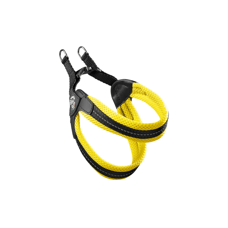 Ergonomisches Hundegeschirr in leuchtendem Gelb und Schwarz aus atmungsaktivem Netzmaterial mit stabilen Schlaufen.