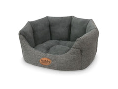 Ovales Komfortbett „JOSI“ in Braun für Hunde mit weich gepolstertem, karierten Bezug. Ideal für gemütliche Ruhephasen.