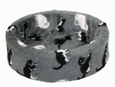 Rundes Plüschbett für Katzen mit grauem Bezug und schwarzen Katzenmotiven, hoher Rand und weiche Liegefläche.
