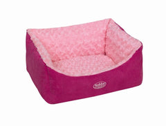 Rechteckiges Hundebett "ARUSHA" in Pink mit flauschiger Hellrosa-Polsterung und erhöhten Wänden für gemütlichen Schlaf.