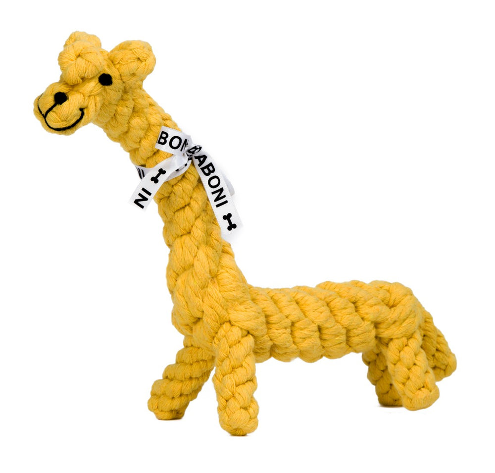 ALT-Text: Gelbe Giraffe aus geflochtenem Material, das beliebte Greta Giraffe Spielzeug für Hunde mit lächelndem Gesicht.