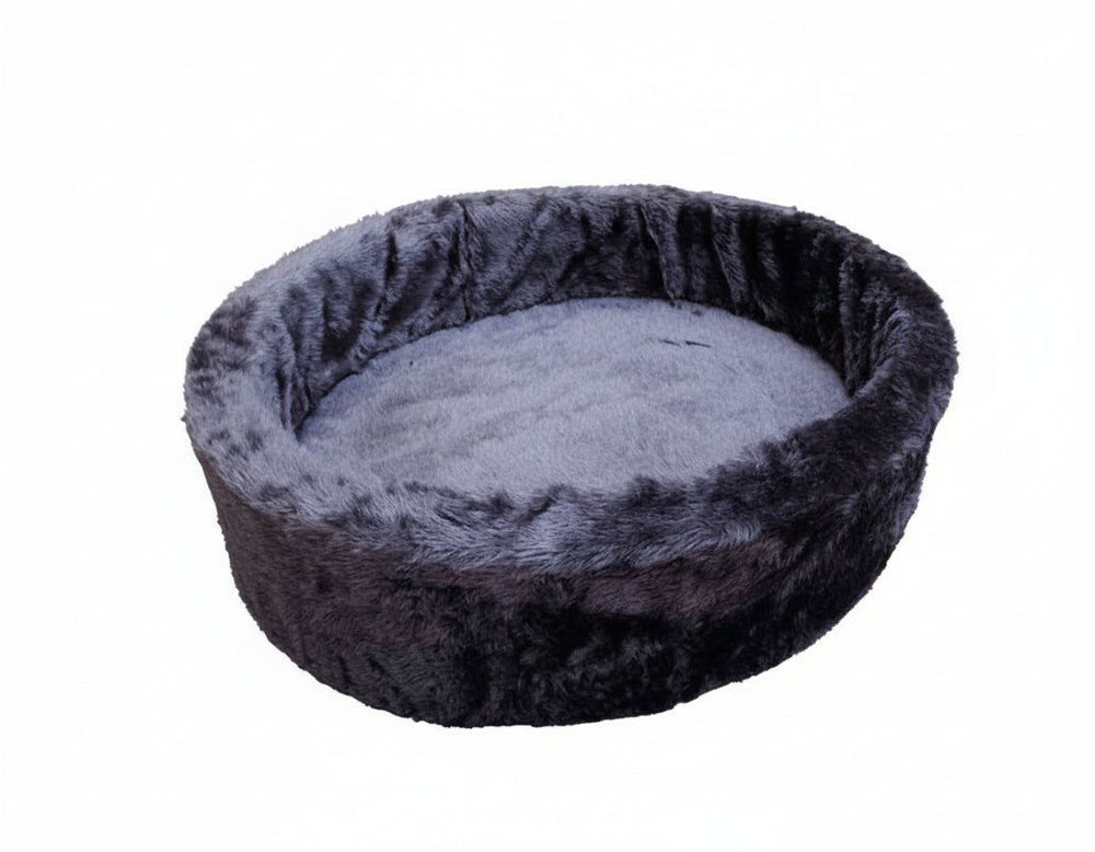 Rundes, graues Plüschbett für Haustiere mit flauschiger Oberfläche und hohem Rand für optimalen Komfort.