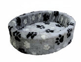 Rundes Plüschbett "Pfote" mit grauem Stoff und dekorativen schwarzen und weißen Pfotenabdrücken, ideal für Tiere.