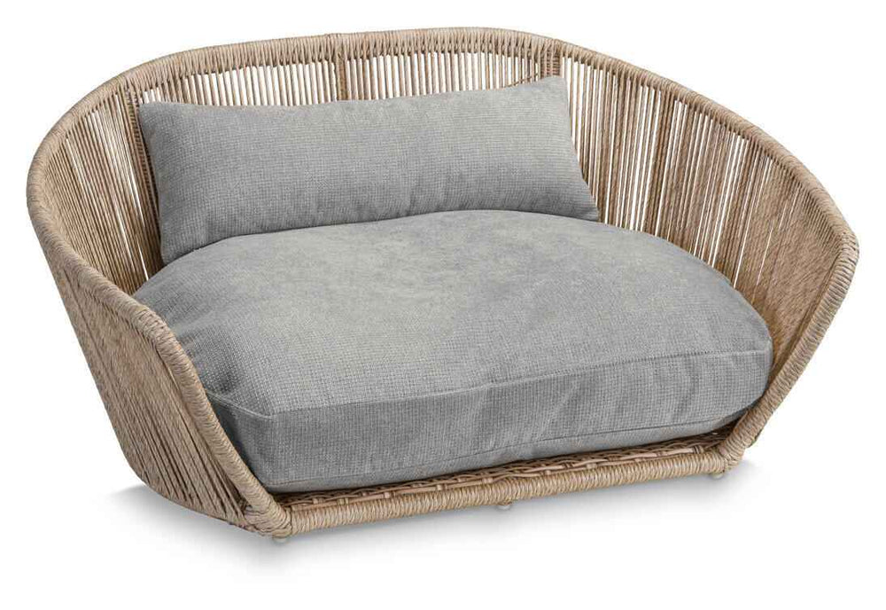 Modernes Design-Hundebett TUDOR in Rattanoptik mit grauem, gepolstertem Kissen für optimalen Komfort.
