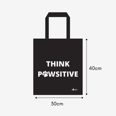 Baumwolltasche "Think Pawsitive" in Schwarz mit weißem Schriftzug und Pfotenmotiv, ideal für Hundeliebhaber und umweltfreundl