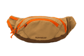Braune Ruffwear Home Trail™ Hüfttasche mit orangefarbenen Akzenten, ergonomisch und ideal für Outdoor-Aktivitäten.