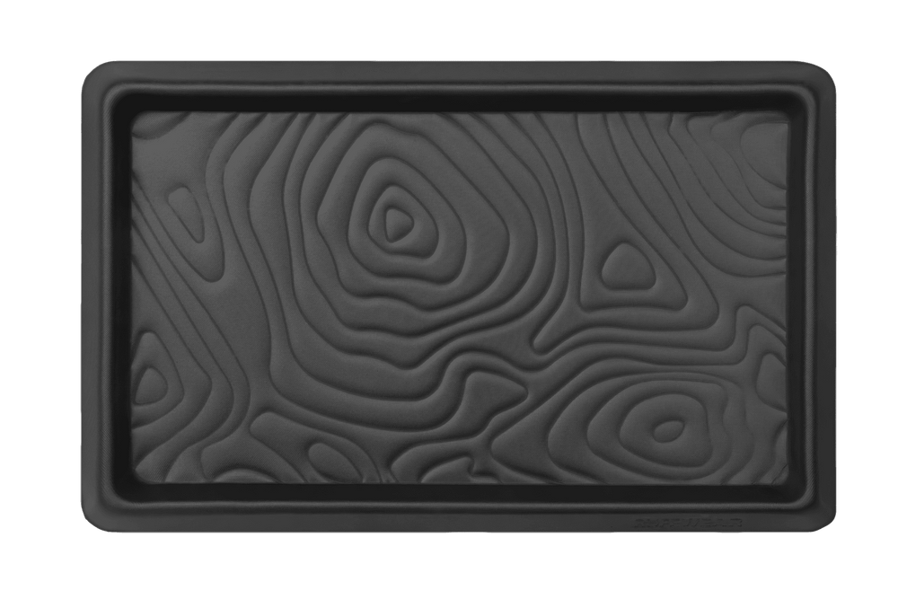 Rechteckige schwarze Silikon-Backform mit wellenförmigem Muster, ideal für vielseitige Küche und Backprojekte.