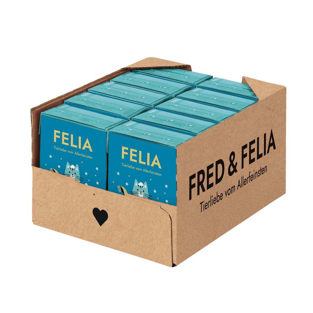 Kartonverpackung des FELIA Winterdrinks für Katzen in Blau mit Tierillustration und "FRED & FELIA" Schriftzug.