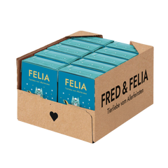 Kartonverpackung des FELIA Winterdrinks für Katzen in Blau mit Tierillustration und "FRED & FELIA" Schriftzug.