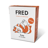 Nassfutter FRED Pute mit Kartoffeln für Junghunde in verspielter Verpackung mit cartoonhaftem Hund.