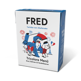 Verpackung des FRED Tricolore Menüs mit Hundeillustrationen und französischen Symbolen wie dem Eiffelturm.