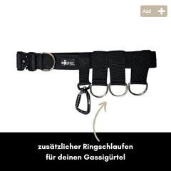 Schwarze D-Ring Schlaufe für Gassigurt mit Karabinerhaken und mehreren Ringen, ideal für Hundeleinen.