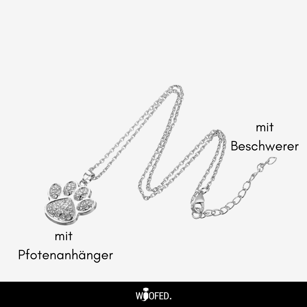 Silberne Halskette mit glitzerndem Pfotenanhänger und beschwerendem Element für Tierliebhaber.
